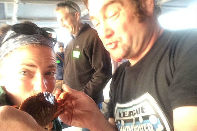 Lori kissing a crab with Diver Ed Lori kissing a crab with Diver Ed